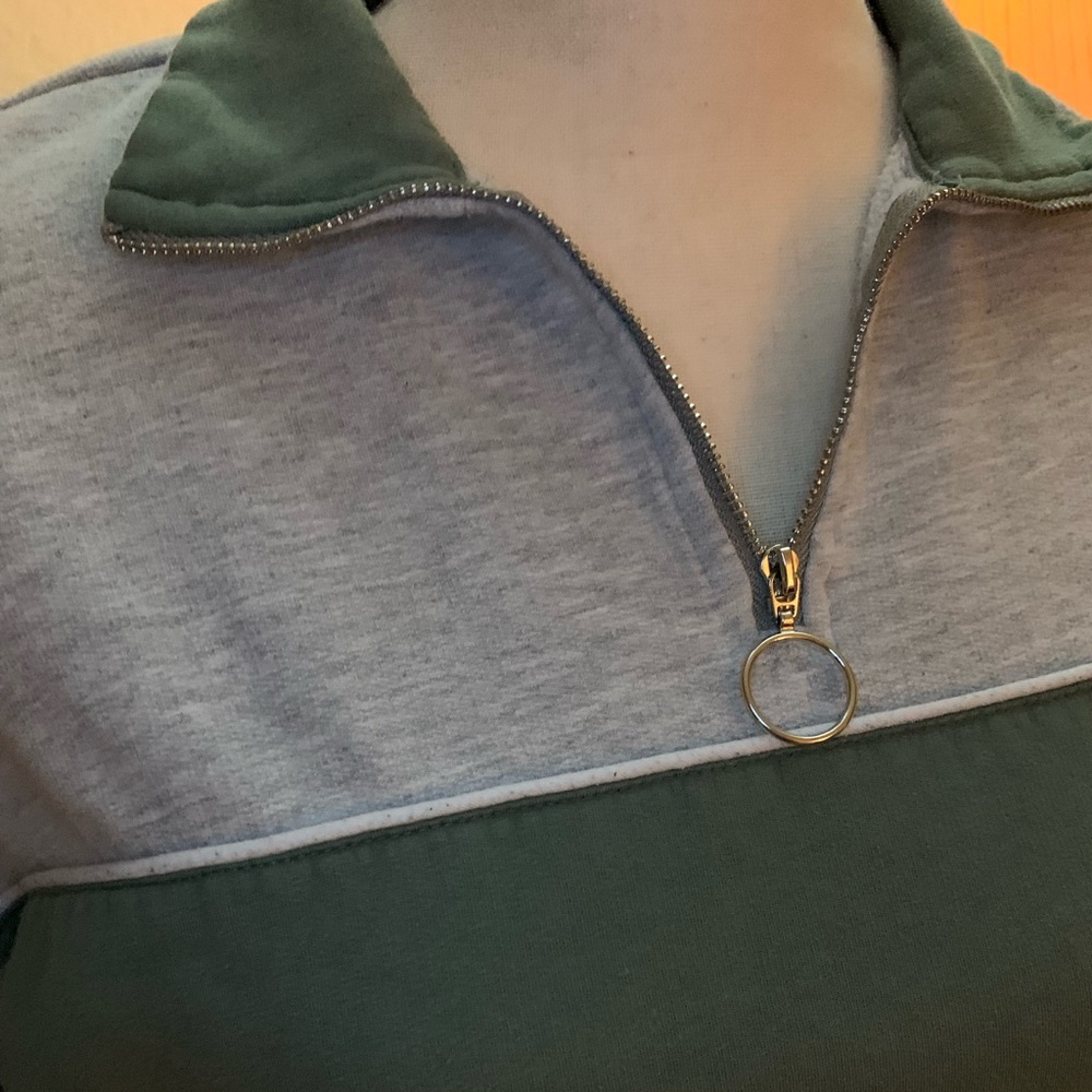 Gray and green sweatshirt